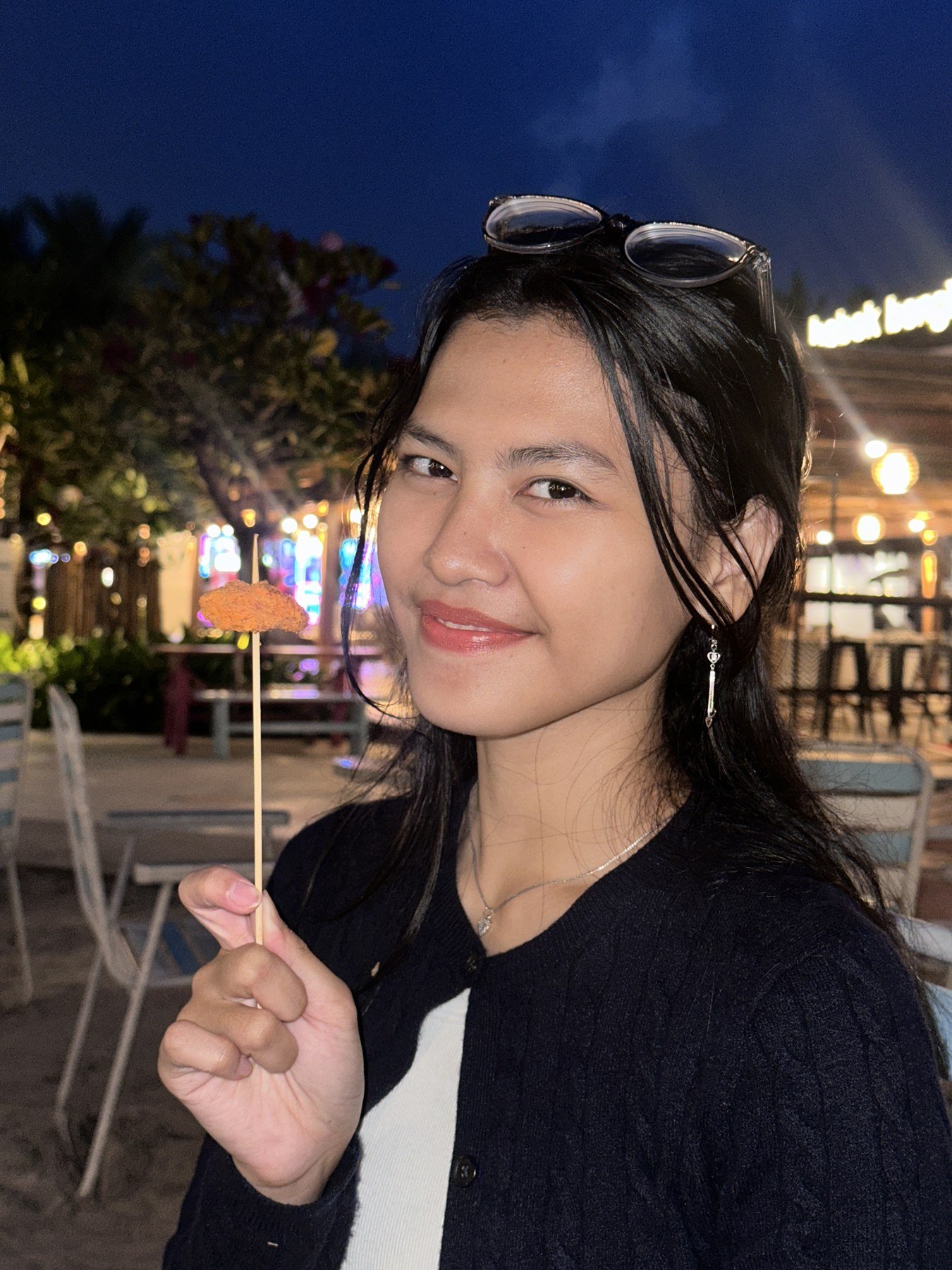 Via smiling on a night out